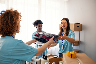 volunteers working with donations