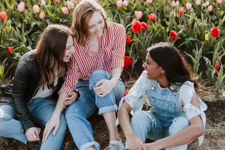 group of women with flowers